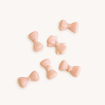 Mon Cheri pink bow wax melts with cherry, rose and vanilla, packed in a round kraft box with label sticker, ribbon and gypsophila.