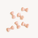 Mon Cheri pink bow wax melts with cherry, rose and vanilla, packed in a round kraft box with label sticker, ribbon and gypsophila.